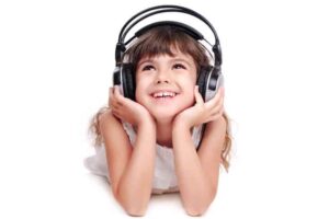 Girl With Headphones On Enjoying Music
